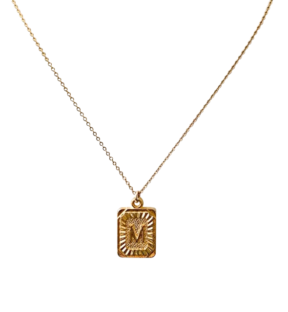 Rectangle initial pendant in gold "M" initial made by Meghan Bo Designs.